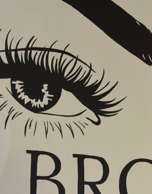 Close-up of Brow Game Strong: one painted eye with long lashes under a bold brow