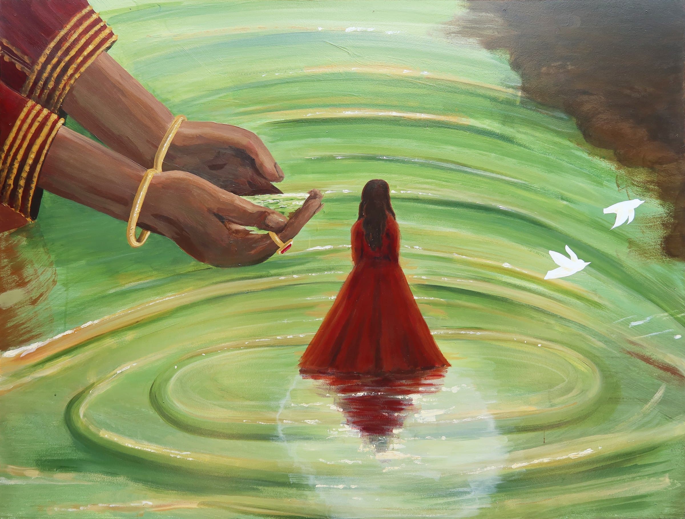 Reflection, bangled hands pouring water over a woman in red standing in rippling green water