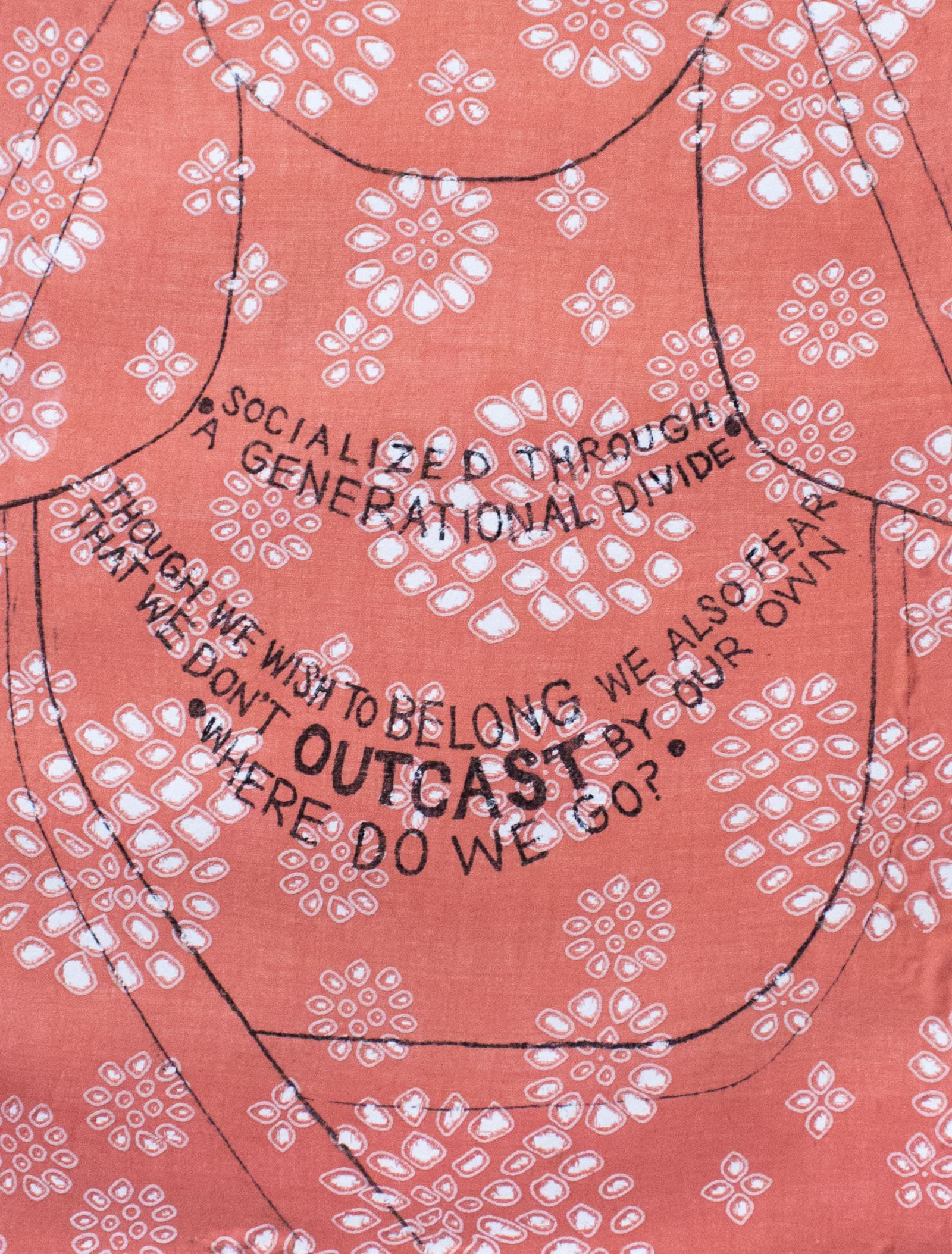 I Am the Diaspora I, lines of poetry drawn as a necklace across a woman’s collar, printed on coral fabric